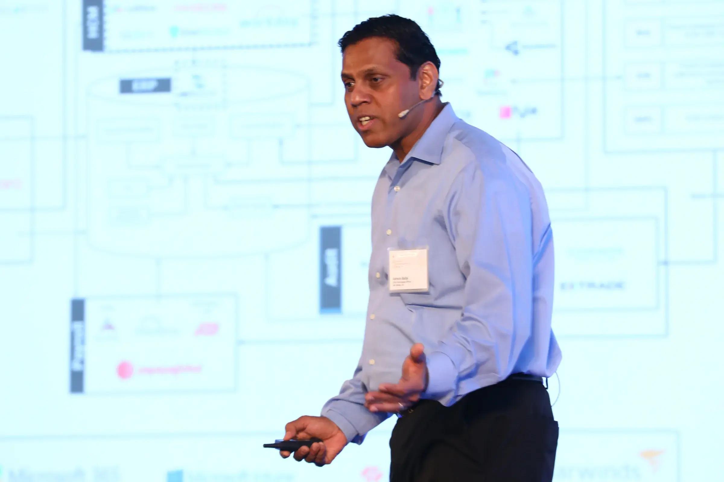 Ashwin Ballal on stage Freshworks Refresh